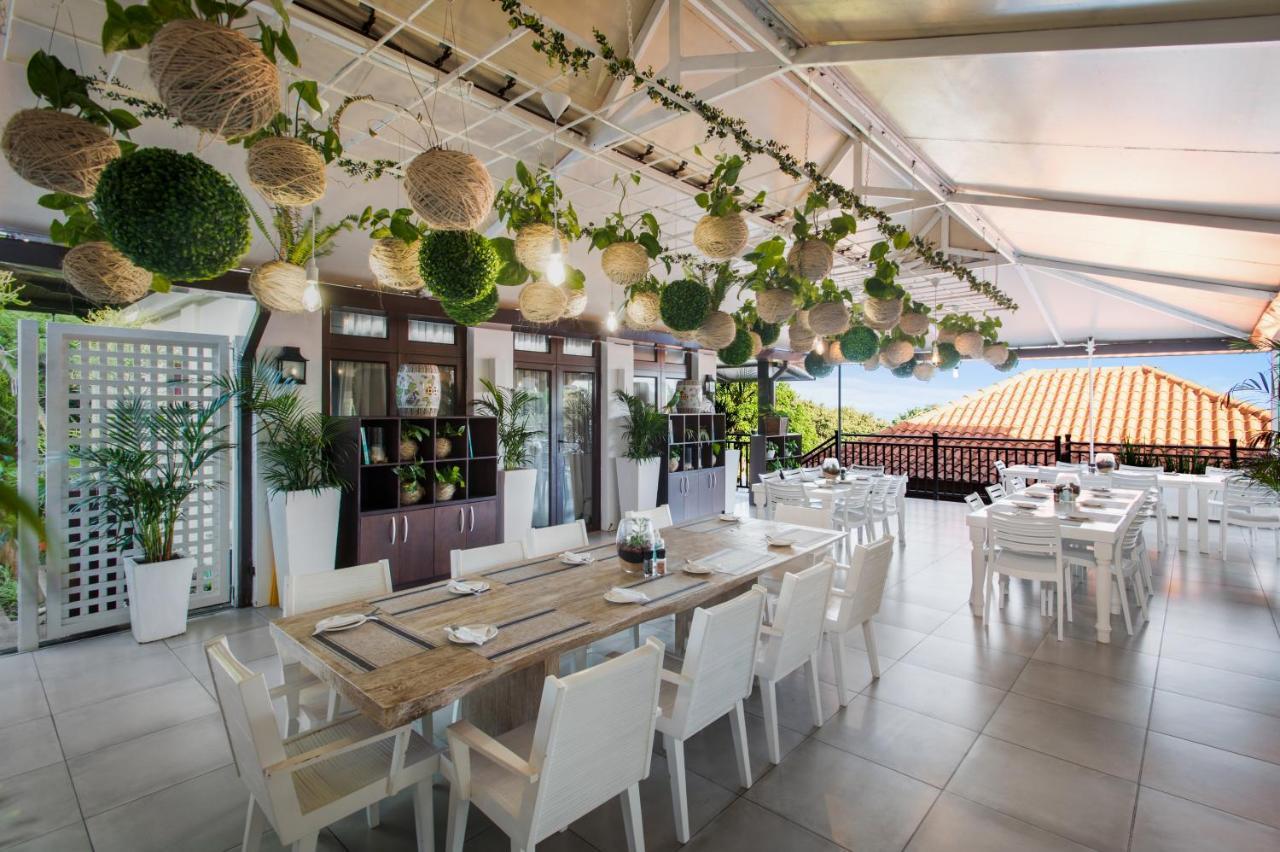 Hotel The Capital Zimbali Ballito Esterno foto The restaurant